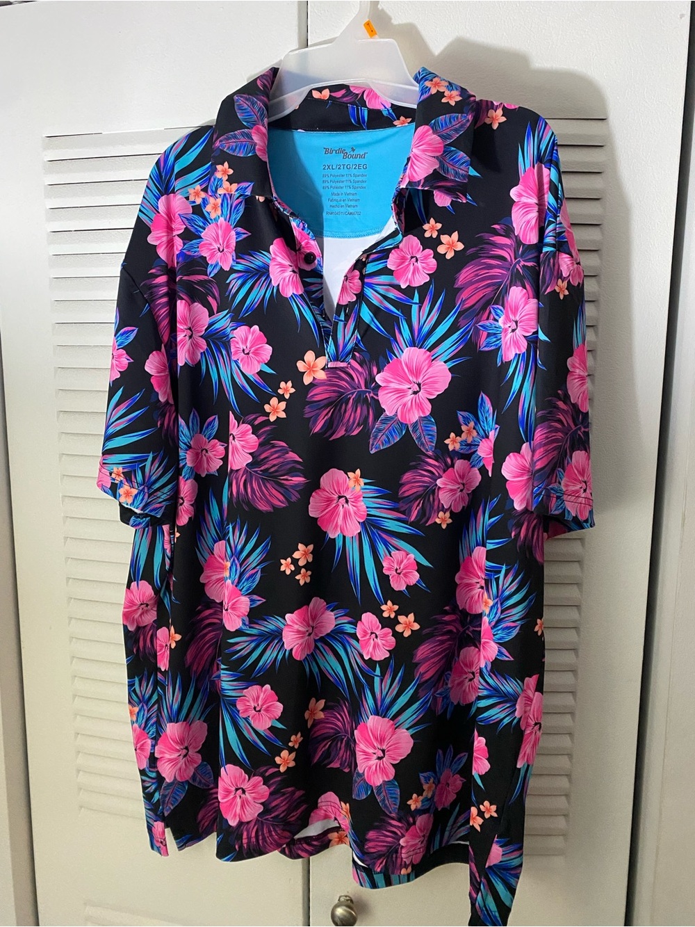 Birdies Black Polo with Pink Floral & Blue Leaf Accents